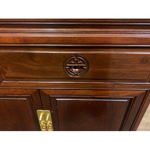 192 - Oriental hardwood sideboard.