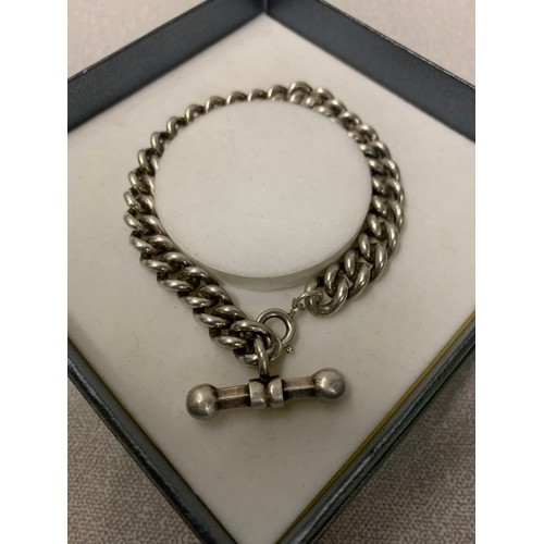 210 - Heavy silver T-bar bracelet.