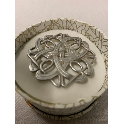 211 - Silver Celtic knot brooch.