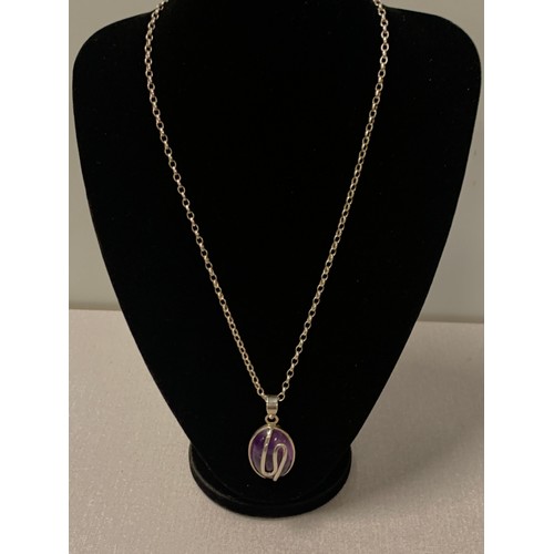 215 - Silver chain with silver and purple stone pendant.