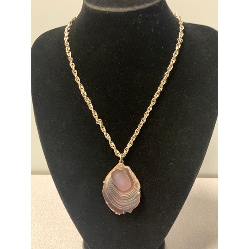 216 - Silver chain with large agate stone pendant.