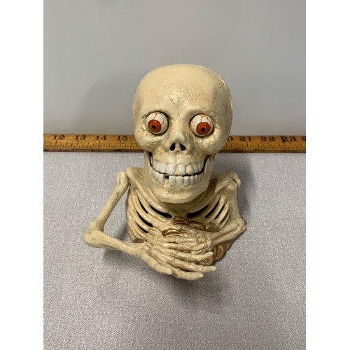 94 - Cast Iron skeleton figure.
