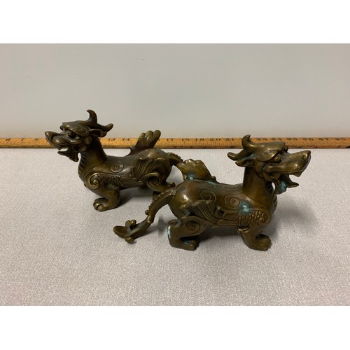 112 - Pair of bronze/brass oriental dragon figures.