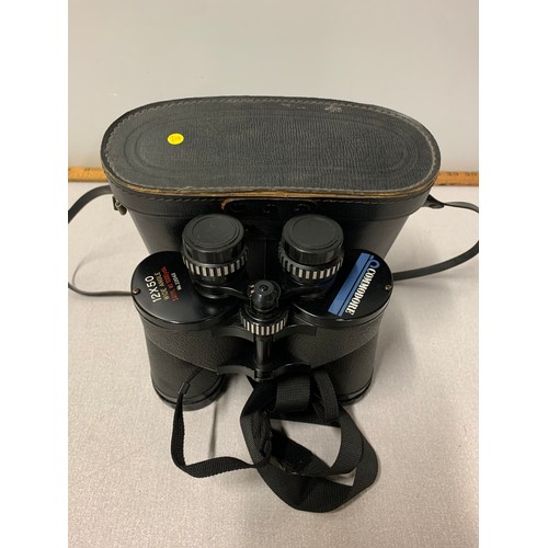 113 - Pair of Commodore binoculars and case.