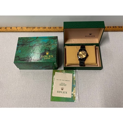 133 - Boxed replica wrist watch.