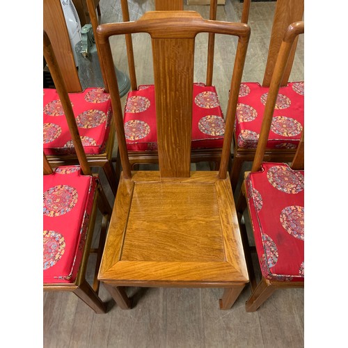 178 - Set of eight solid wood Oriental chairs with seat cushions.