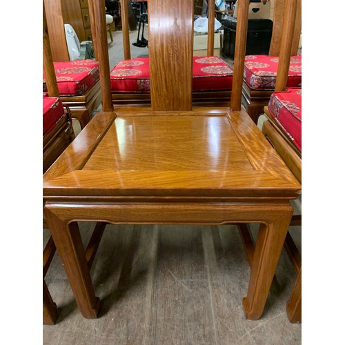 178 - Set of eight solid wood Oriental chairs with seat cushions.