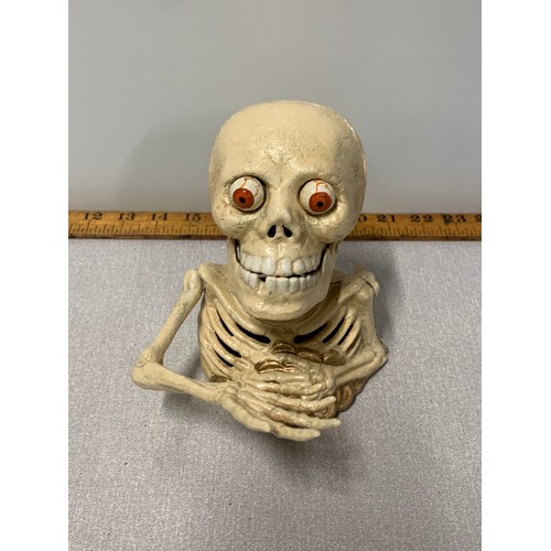 252 - Cast Iron skeleton figure.