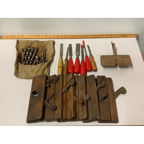 254 - Selection of vintage wooden tools to include planes and chisels etc.