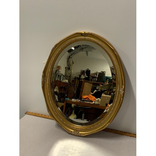 271 - Vintage gilt framed oval wall mirror.