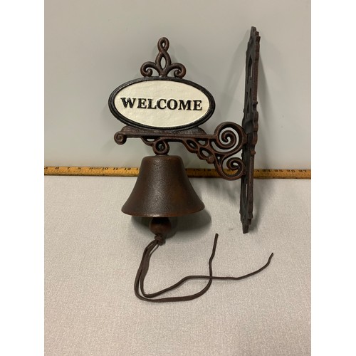 325 - Cast iron Welcome door bell.