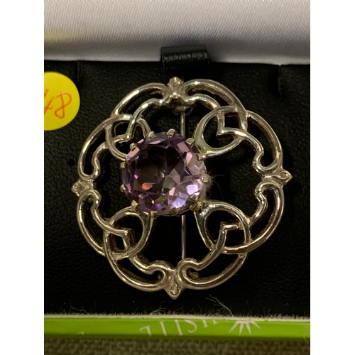 357 - Scottish silver brooch with amethyst stone.