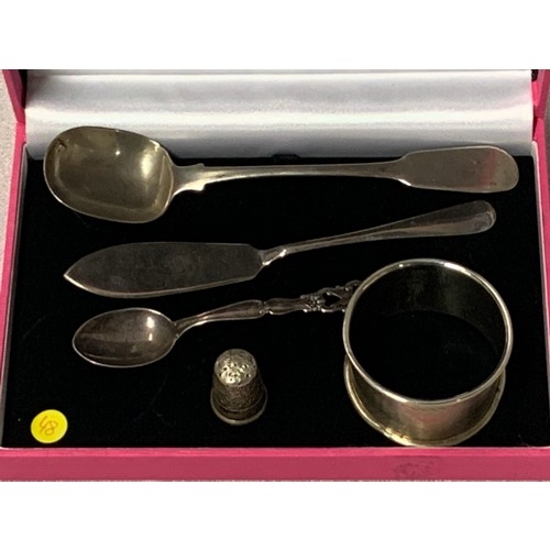 418 - Selection of hallmarked silver items to include serving spoon, tea spoon, fish knife, napkin ring an... 