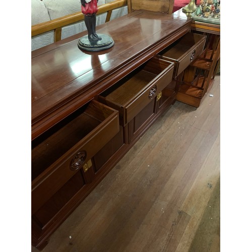 94 - Oriental hardwood 3 drawer sideboard with brass fittings. l168cm x w89cm x h81cm.