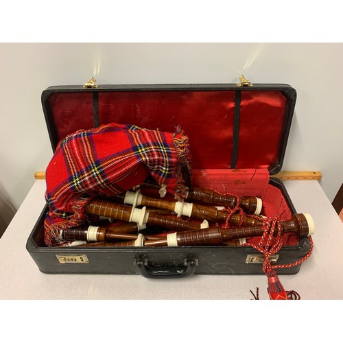 17 - Set of Indian bagpipes in case.