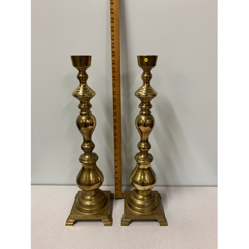 20 - Pair of vintage brass floor candlesticks
22inches tall