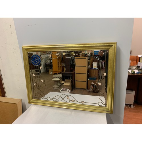 51 - Large Gilt framed wall mirror with Rennie Mackintosh design 103cm x 73cm.