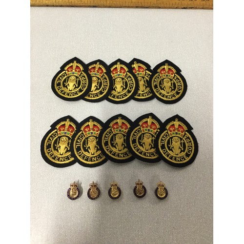 22 - 10x Civil Defence Corp embroidered badges along with 5 x J R Gaunt lapel badges.