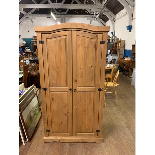 38 - Mexican pine 2 door wardrobe.
184h x 100w x 57d