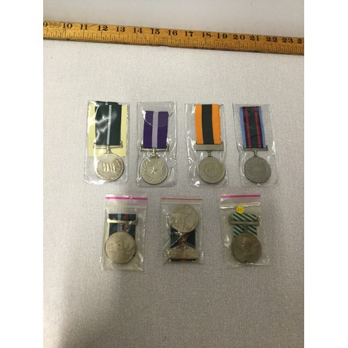 54 - 7 x Pakistan commemorative and service medals.