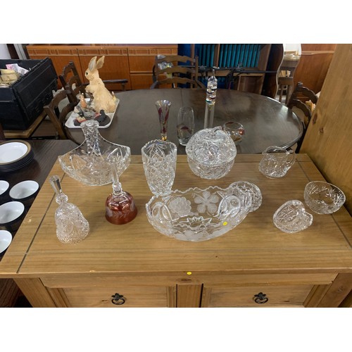 58 - Collection of crystal items to include fruit bowl and lidded apple bowl etc.