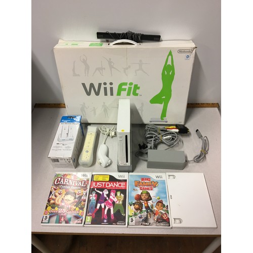 151 - Nintendo Wii console with Wii fit board, games and accessories.