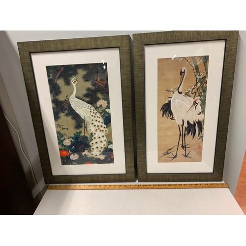 256 - Pair of framed, signed Oriental bird prints. 71cm tall x 42cm wide and 71cm tall x 48cm wide