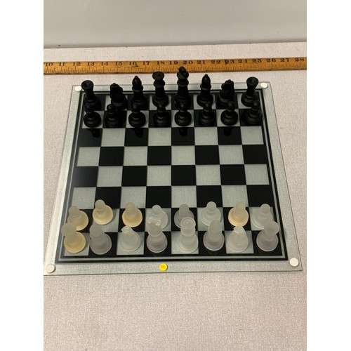 257 - Glass chess set and board.