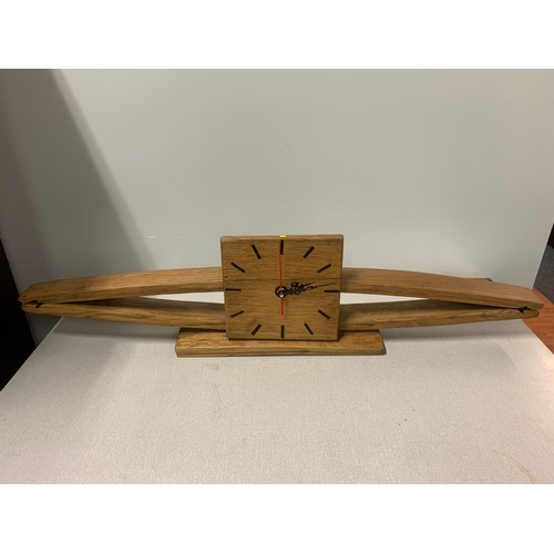 57 - Arts and crafts solid wood oak whiskey barrel mantle clock.
89cm l