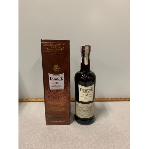 73 - Boxed bottle of Dewars 18 year old blended Scotch Whisky.