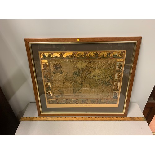 70 - Framed world map from an original engraving by Moses  Pitt 1681 in gold foil.
66cm x 56cm