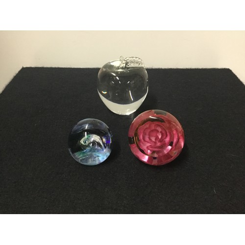 97 - 2 x signed Caithness paperweights and 1 x Pairpoint apple paperweight marked to base.