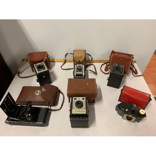 159 - 6 x vintage cameras and cases.