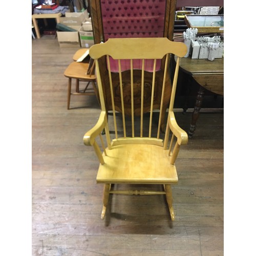 236 - Solid pine rocking chair.