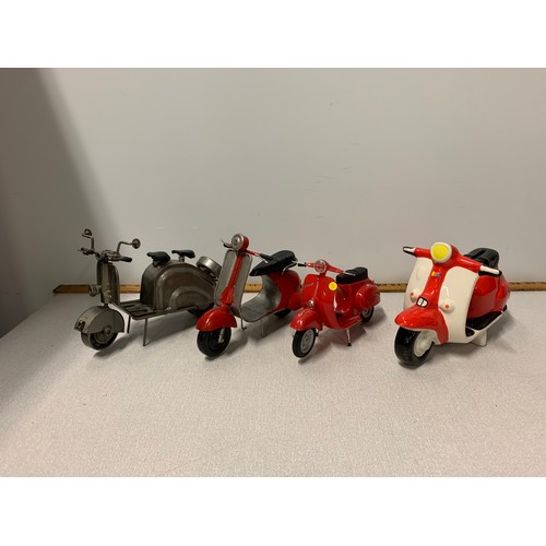 225 - 3 x model Vespa scooters along with ceramic scooter coin bank.