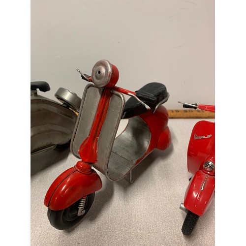 225 - 3 x model Vespa scooters along with ceramic scooter coin bank.