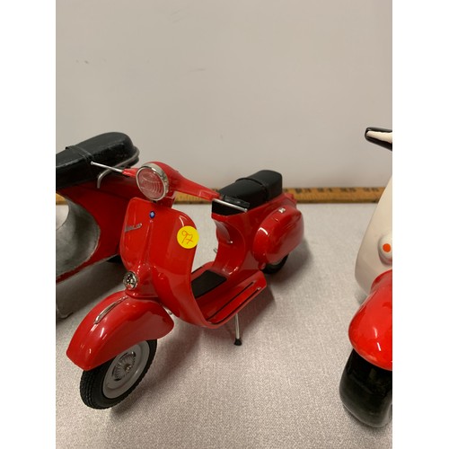 225 - 3 x model Vespa scooters along with ceramic scooter coin bank.