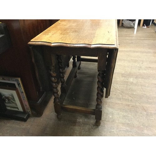 261 - Vintage oak gate leg, barley twist table.