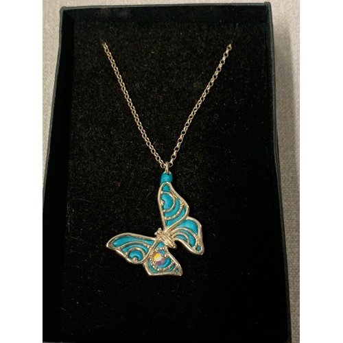 323 - Scottish silver butterfly pendant and silver chain.