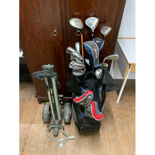 410 - Set of good quality golf clubs and buggy.