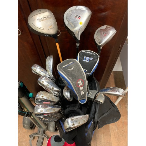 410 - Set of good quality golf clubs and buggy.