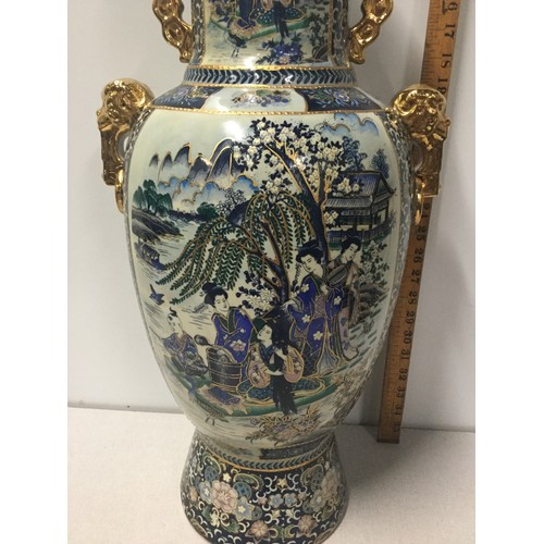 436 - Large Oriental style vase Depicting Geishas.
61cm Tall