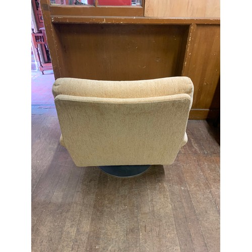 459 - Mid Century Pieff Upholstered swivel/recline arm chair.