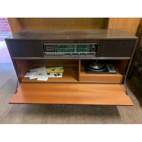 461 - Grundig record player cabinet with Garrard turntable.
118cm l x 38cm d x 78cm h