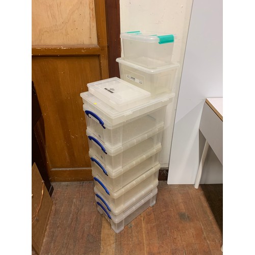 484 - 10 assorted storage boxes.