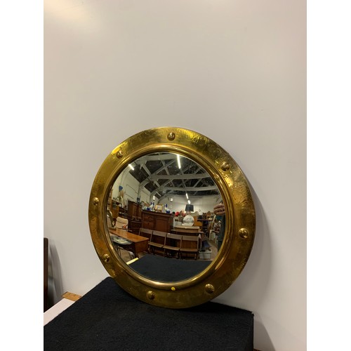 500 - Vintage brass Port hole wall mirror.
48cm Diameter