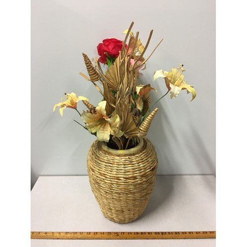 681 - Wicker vase with bouquet of artificial flowers.
30cm h