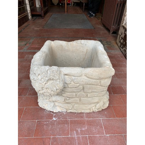 121b - Stone garden well planter.