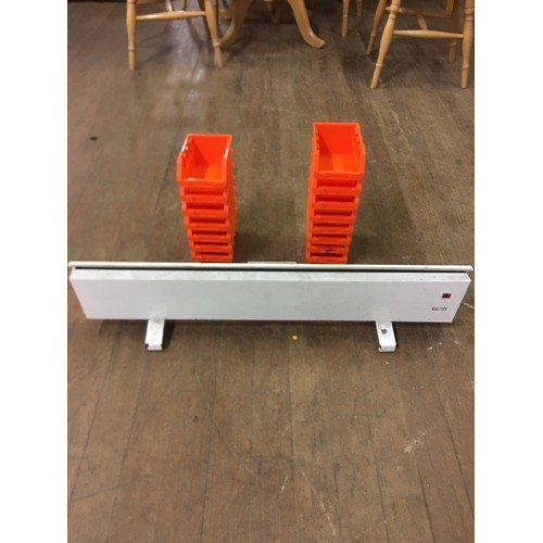 708 - Electric heater and qty of plastic trays.