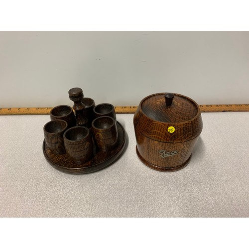 6 - Vintage wooden tea caddie and 6 barrel shaped egg cups on carrier.